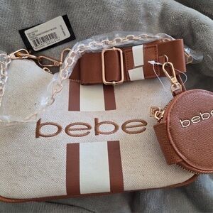 Bebe Paisley Caramel
Crossbody with coin purse NWT MSRP 99.00